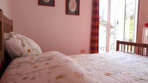 Postel nebo postele na pokoji v ubytování B&B Tre Confini