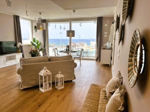 Posezení v ubytování Eyes on the sea - Suite deluxe vista mare