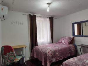 Ένα ή περισσότερα κρεβάτια σε δωμάτιο στο Shalom_MatSofy
