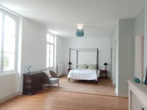 Postel nebo postele na pokoji v ubytování Domaine de Lamagistère - Gite de groupe - Piscine + 25 fotografií