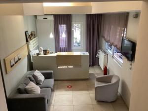 A television and/or entertainment centre at Alexandros