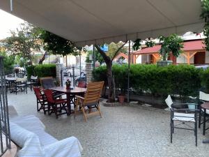 A restaurant or other place to eat at Alexandros