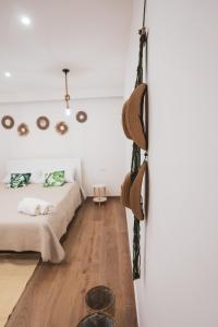 Postel nebo postele na pokoji v ubytování Macramè Room