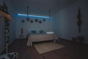 Postel nebo postele na pokoji v ubytování Macramè Room