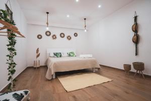 Postel nebo postele na pokoji v ubytování Macramè Room