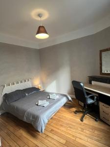 Katil atau katil-katil dalam bilik di Appartement T2 centre-ville Aurillac