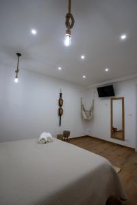 Postel nebo postele na pokoji v ubytování Macramè Room