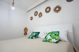 Postel nebo postele na pokoji v ubytování Macramè Room