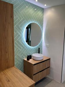 Ένα μπάνιο στο Apartamento Dlirio Lujo y Confort +13 φωτογραφίες