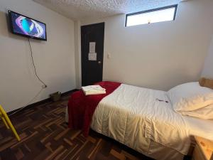 Postel nebo postele na pokoji v ubytování St. Gallen Haus