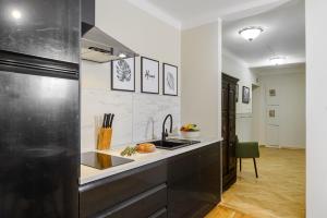 Kuchyňa alebo kuchynka v ubytovaní P&O Podwale Apartments