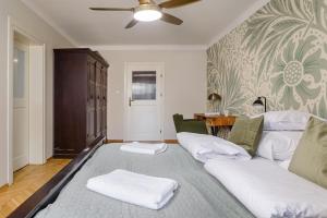 Posteľ alebo postele v izbe v ubytovaní P&O Podwale Apartments