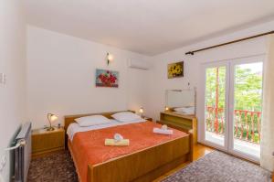 Posteľ alebo postele v izbe v ubytovaní Rooms Ante