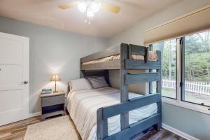 Ένα ή περισσότερα κρεβάτια σε δωμάτιο στο Livywood Cottage