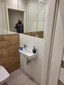 Kúpeľňa v ubytovaní Apartament Rzeczypospolitej + 7 fotografií