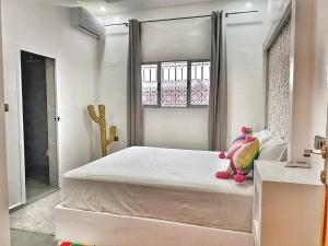 Villa Charfa Élégance Confort et Vues Panoramiques tesisinde bir odada yatak veya yataklar