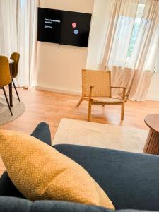 โทรทัศน์และ/หรือระบบความบันเทิงของ City-Apartment - private parking +10 ภาพ
