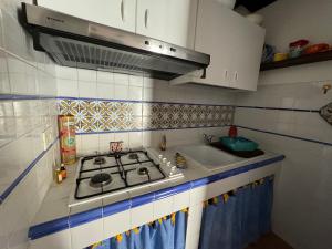 Cucina o angolo cottura di Residenza sul Mare Baia Cornino
