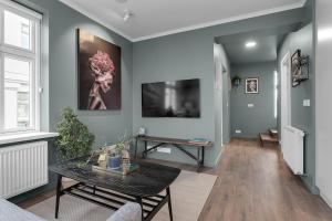 Μια τηλεόραση ή/και κέντρο ψυχαγωγίας στο Charming apartment in Selfoss center