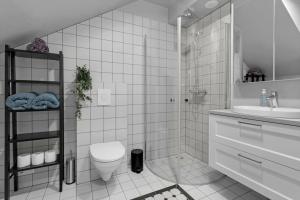Ένα μπάνιο στο Charming apartment in Selfoss center +20 φωτογραφίες
