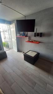 TV a/nebo společenská místnost v ubytování CASA AMUEBLADA 15 MIN ZONA ANGELOPOLIS