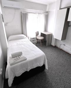 Postel nebo postele na pokoji v ubytování Hotel Plaza Formosa