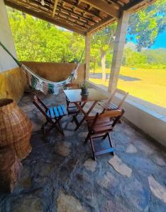 Reserva do Bosque Hospedaria e Natureza的阳台或露台