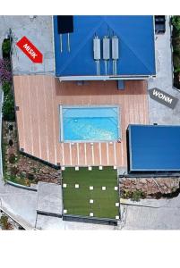 an overhead view of a building with a swimming pool at La Perle du Cap in Case-Pilote