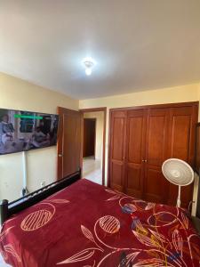Ένα ή περισσότερα κρεβάτια σε δωμάτιο στο Suites Macarena Lux +33 φωτογραφίες
