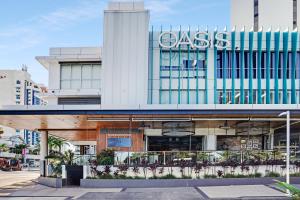 a building with a sign on the side of it at Oracle 2 1907 in Gold Coast