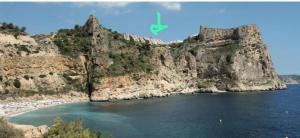 a view of a mountain with a beach and water at Villas Moraig in Benitachell +28 photos