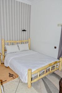 Ένα ή περισσότερα κρεβάτια σε δωμάτιο στο Hotel Safari Week end