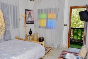 Ένα ή περισσότερα κρεβάτια σε δωμάτιο στο Hotel Safari Week end