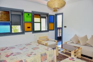 Ένα ή περισσότερα κρεβάτια σε δωμάτιο στο Hotel Safari Week end