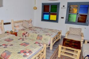 Ένα ή περισσότερα κρεβάτια σε δωμάτιο στο Hotel Safari Week end