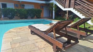 A piscina localizada em Pousada Rosa dos Ventos Juquehy ou nos arredores