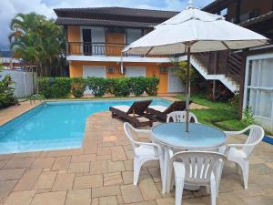 A piscina localizada em Pousada Rosa dos Ventos Juquehy ou nos arredores