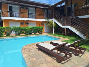 A piscina localizada em Pousada Rosa dos Ventos Juquehy ou nos arredores