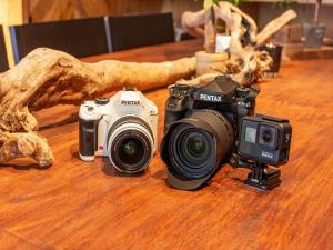 a camera sitting on top of a wooden table at Focus Kuramae in Tokyo