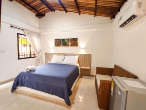 Postel nebo postele na pokoji v ubytování Senderos del Mar - Tayrona