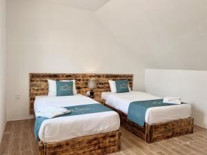Katil atau katil-katil dalam bilik di Zephyrus Villa - Deluxe