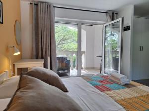 Ein Bett oder Betten in einem Zimmer der Unterkunft Villa HAUS NIKO