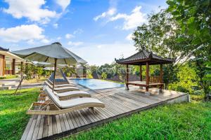 Bazén v ubytování Kana Village Villa by Kozystay - Near Canggu nebo v jeho okolí