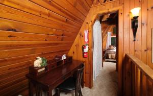 a wooden room with a desk in a cabin at Shepherds Crook 1127 in Gatlinburg