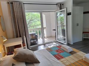 Ein Bett oder Betten in einem Zimmer der Unterkunft Villa HAUS NIKO