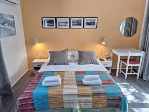 Ein Bett oder Betten in einem Zimmer der Unterkunft Villa HAUS NIKO