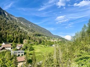 a village in a valley in the mountains at Sweet Mountain Home in Bad Bleiberg