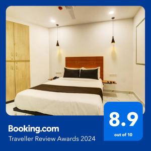 מיטה או מיטות בחדר ב-Rcc Hotel Banjara Hills