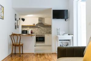 Kuchyň nebo kuchyňský kout v ubytování Ragusa Old Town Apartments