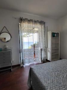 A bed or beds in a room at Appartamenti Vanacore Még 37 kép